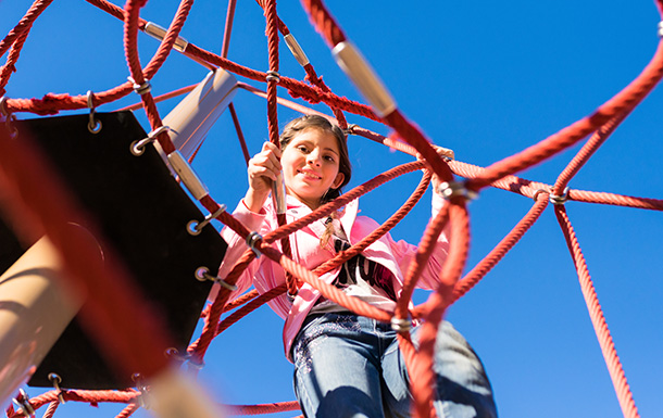 Girl on ropes course